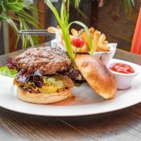 Mama Burger · 10 oz. grilled burger stuffed with chorizo and mozzarella cheese, fried onions, fried pickle...
