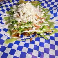 Flautas Meat · 4 Crispy Hand-Made Flautas with our delicious Sour Cream, Guacamole, Le usettuce, Tomato, an...