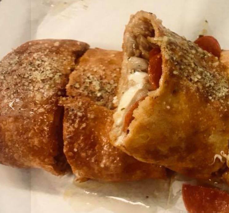 Stromboli  · Folded pizza, pizza sauce side, provolone cheese and 1 item.