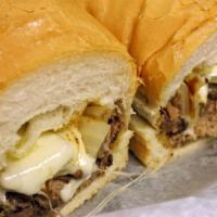Pot Roast Sandwich · A mound of beef pot roast with sauteed onions, provolone cheese, garlic spread and mayonnais...