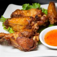 Thai Wing · Chicken wing golden fried and served with sweet chili sauce. 