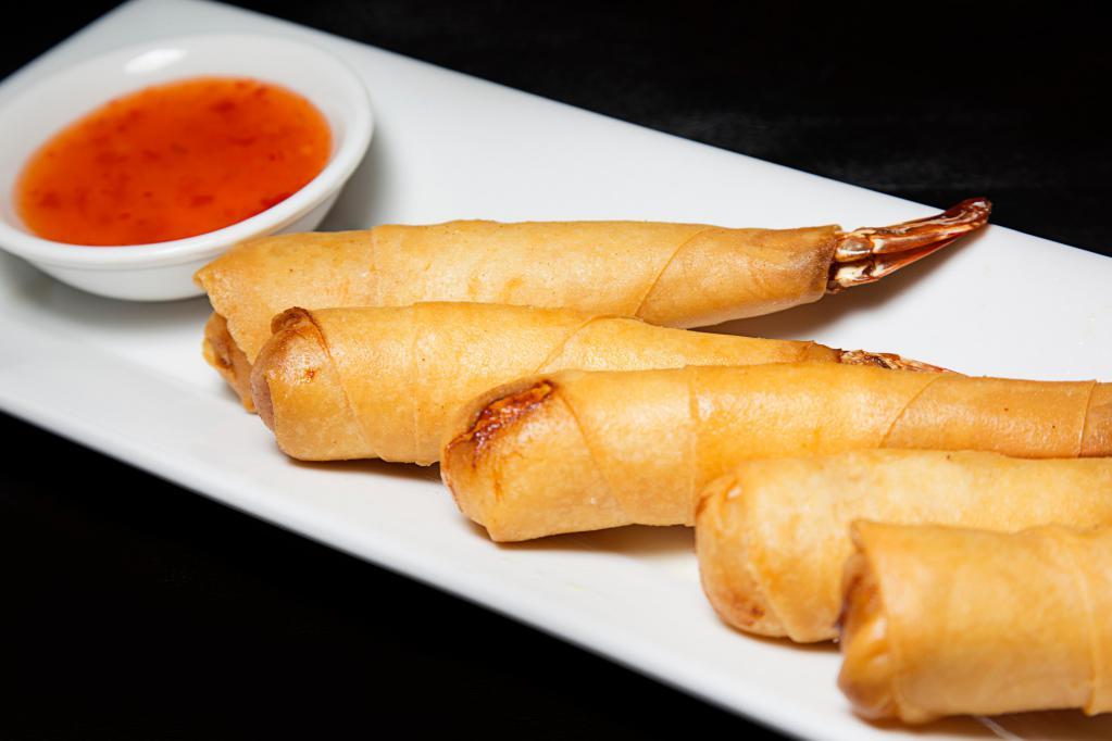 Shrimp Roll · Golden fried shrimp rolls served with sweet chili sauce. 