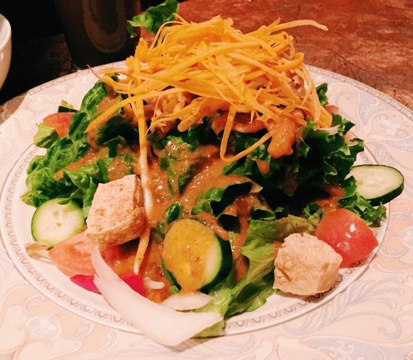 Thai Salad · Green vegetable salad with peanut dressing. 