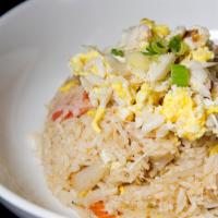 Crab Meat Fried Rice · Lump crab meat, onion, egg, and tomato fried rice.