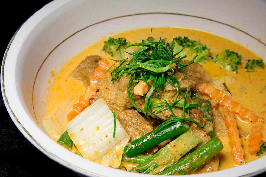 Vegetarian Duck Panang · Mock duck (soybean extract) in spicy panang curry with coconut milk. Served with jasmine rice