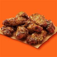 Garlic Parmesan Caesar Wings · Oven roasted wings with a creamy garlic Parmesan sauce.
