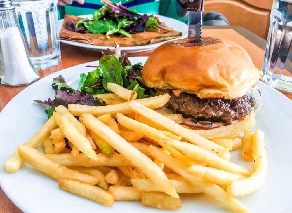 Le Burger de Maman Dinner · Angus burger with Brie cheese, tomato, onions, secret sauce in a brioche bun, served with salad and french fries