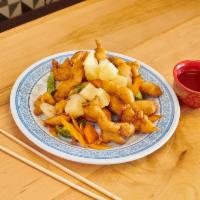 Sweet and Sour Chicken · Golden brown and crispy, flavored with pineapple bell pepper etc. Sauce a side.