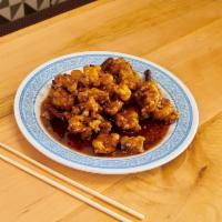 General Tao's Chicken · The chicken dish that over whelmed general Tao glazed, golden brown and tasty sweet brown sa...