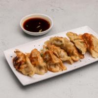 Pork Dumplings (8饺子) · 8 pieces.