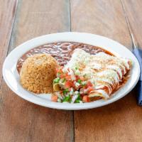 Enchilada · Chicken enchilada served with rice and beans.