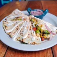 Vegetarian Quesadilla  · Mexican pumpkin, corn, peppers,  broccoli, avocado, and cheese. Served with pickled red onio...