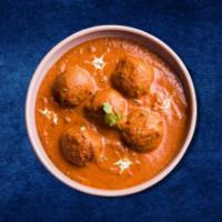 Malai Kofta · Deep-fried paneer and potato balls, dunked in creamy smooth sweet onion gravy served with a ...