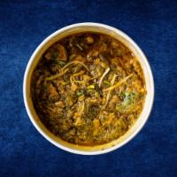 Lamb and Spinach · Boneless lamb morsels simmered in a thick, creamy spinach curry served with a rice.