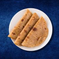 Plain Paratha · Unleavened Indian flatbread. Vegetarian.
