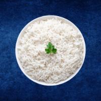 Steamed Basmati Rice  · Long grain basmati rice steamed to perfection. Vegetarian.