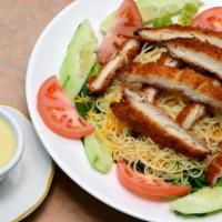Honey Crispy Chicken Salad · Breaded crispy chicken breast over lettuce, tomatoes, cucumber, red onions, cheddar cheese a...