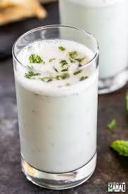 Masala Chaas · Buttermilk blended with cilantro, mint, green chilies, ginger and cumin powder.