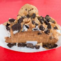 The Cookie Monster Taco · Cookies and cream ice cream, Cinnamon Toast Crunch, Oreo crumbles, Chips Ahoy, and caramel s...