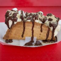 S'more Lovin' Taco · Vanilla ice cream, chocolate chips, marshmallows, crumbled graham crackers, and chocolate sy...