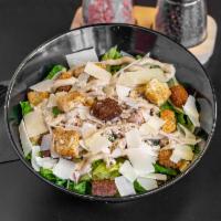 Chicken Caesar  · Romaine lettuce, all-natural grilled chicken, croutons, fresh Parmesan cheese, and signature...