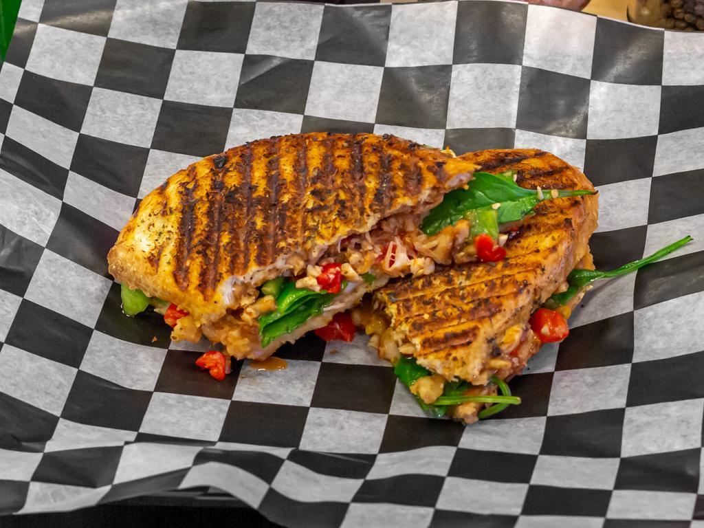 Smokey Aioli Sandwich · Sourdough bread, house-made special aioli sauces, spinach, roasted red peppers, and provolone cheese. Add chips or fried onions inside the sandwich for an additional charge.