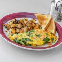 Veggie Omelet Breakfast · Green peppers, onions, tomatoes, mushrooms, cheddar, with home fries.