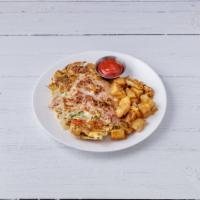 Western Omelet · Ham, peppers, onions and tomatoes with American cheese. With 3 extra large eggs, served in a...