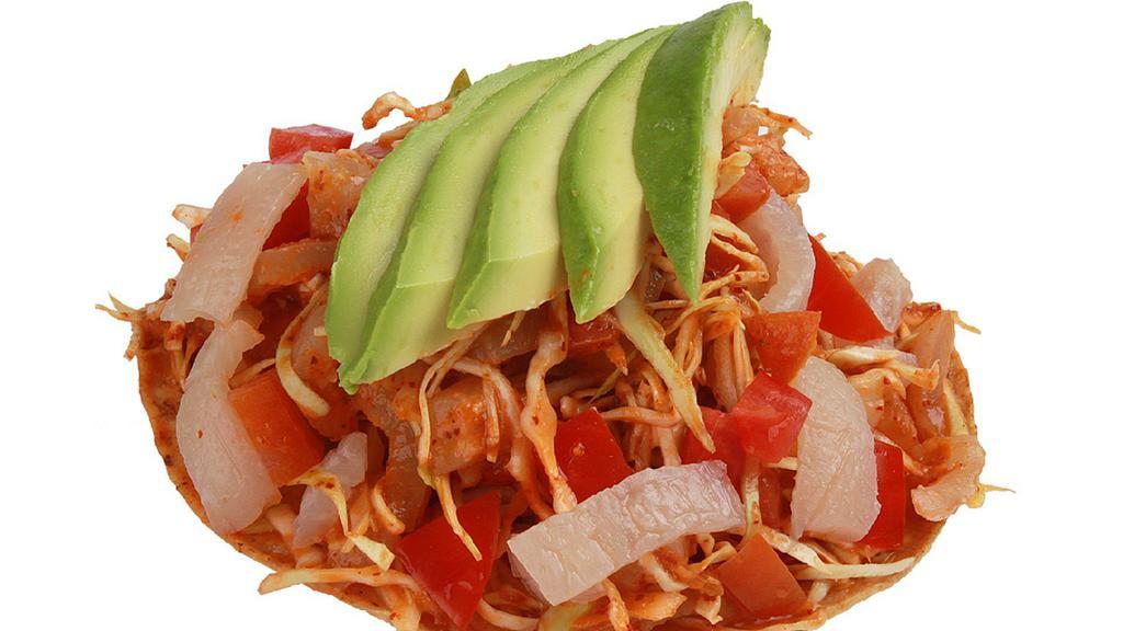 42. Tostada del Moco (Very Spicy) · With cueritos, cabbage, tomato, avocado, Cleme's special sauce and lime juice.