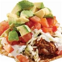 44. Tostada de Tinga (Spicy) · Shredded chicken in our house special sauce, beans, lettuce, tomato, avocado and sour cream ...