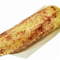 Elote Entero · White Corn in the Cob, Mayo, Chile, Parmesan cheese, and lime.
