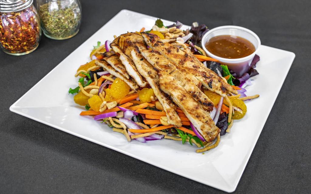 Asian Chicken Salad · Teriyaki chicken breast, mixed greens, red onions, roasted peanuts, mandarin orange, carrots and Asian noodles with ginger sesame dressing.