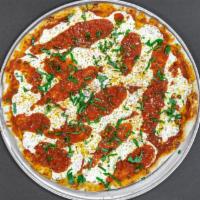 Pizza Margherita · Marinara, fresh mozzarella and basil.
