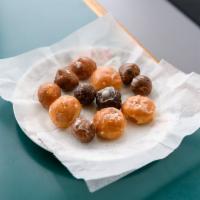 12 Donut Holes · Baker's choice. Assorted selection of 12 donut holes.
