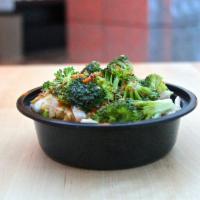 Garlic Chicken Bowl · A traditional Chinese pepper and garlic sauce. Served with steamed broccoli, carrots and oni...