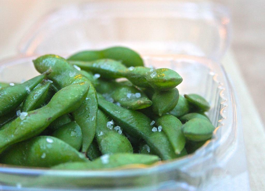 Edamame · Steamed soybeans lightly drizzled with olive oil and sea salt. Gluten free. Vegetarian.