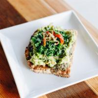 Avocado Toast · Made in house with guacamole, kale, and pesto.