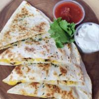 Camarones Quesadilla/shrimps quesadilla  · Cooked tortilla that is filled with cheese and folded in half. 