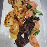 Peters Surf and turf/Mar y tierra  · fish fillet, skirt steak, shrimps, chicken breast, and lobster tail