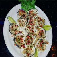 Almeja al oregano /clams with oregano  · Baked clams in a halfshell topped with breadcrumbs and oregano. 