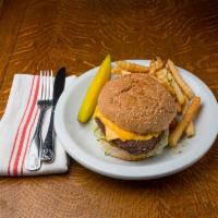 Cheeseburger Deluxe · Served with fries. Grilled or fried patty with cheese on a bun.
