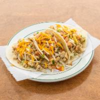 American Tacos · Flour tortilla, lettuce, American cheese, pico de gallo and meat.
