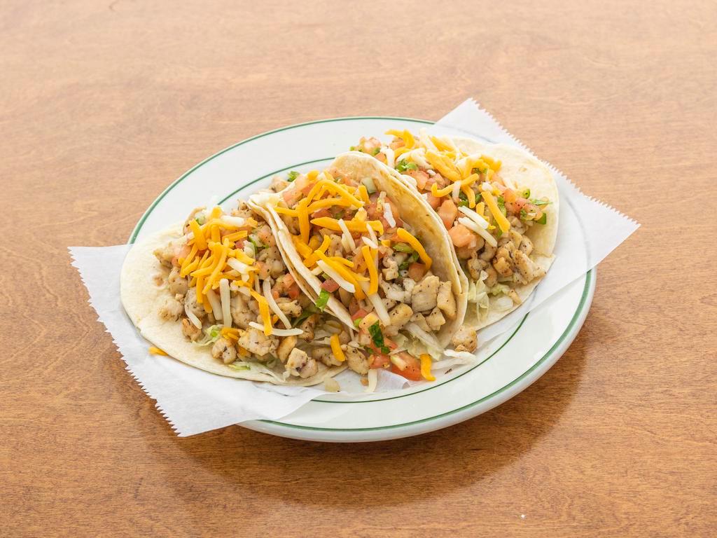 American Tacos · Flour tortilla, lettuce, American cheese, pico de gallo and meat.