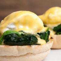 Eggs Florentine · Fresh feta cheese and sauteed locally grown spinach topped with 2 poached eggs. Served with ...