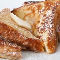 2 Piece French Toast · Fresh challah bread French toast served with a side of syrup and butter.