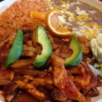 Pollo a la Diabla · Chicken sauteed in margarine, chile, garlic, Mexican spices, onions and mushrooms. Served wi...