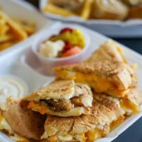Italian Chicken Shawarma · Italian bread with our famous grill chicken topped with garlic sauce and cheddar cheese.