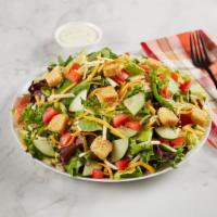 Garden Salad · Cheddar-jack, tomatoes, cucumbers and croutons. Dressing served on the side. Vegetarian.