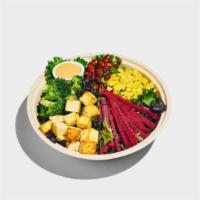 Harvest Salad · Mixed greens, sweet corn, pickled beets, broccoli, almonds, ginger tofu, sesame ginger dress...
