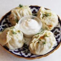 Manti · 4 piece and 1 piece free. Juicy steamed dumplings with chopped lamb.